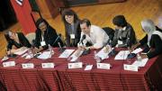 Panelists at the tenth-anniversary symposium discuss how their time as Radcliffe Fellows helped them bridge boundaries between genres. From left to right: English professor Leah Price, painter Beverly McIver, filmmaker Jeanne Jordan, composer Tarik O’Regan, filmmaker Anne Makepeace, and lawyer Hauwa Ibrahim.