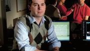 Matthew Nock sits in his lab’s control room, where researchers record subjects’ behavioral and physiological responses during experiments. For example, they might measure whether people who engage in self-injury show greater emotional distress, in response to frustrating tasks, than people who do not. (Nock’s lab manager and a postdoctoral fellow are seen in the adjoining room through one-way glass.)