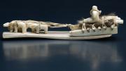 The Inuit artist who created this dogsled from carved ivory, leather, and sealskin is unknown.