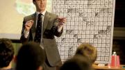 With audience input, Kwong constructs a crossword puzzle containing a hidden message.
