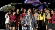 Students sang their hearts out despite the wet weather. 