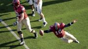 Quarterback Collier Winters dove for Harvard’s third touchdown in a 37-20 defeat of Penn.