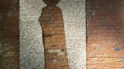 The mosaic <i>Absence</i> (2012) on a wall in Moscow