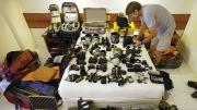 In Papua New Guinea, Tim Laman takes advantage of a rare hotel stop to dry out his 20 lenses, 4 camera bodies, audio and lighting gear, computers, and tree-climbing and camping equipment&mdash;not to mention his clothes and boots. 