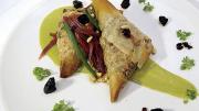 From the menu: phyllo triangles filled with caramelized onions, chard, and tofu, in a sorrel cream sauce
