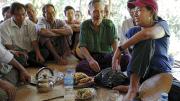 Debbie Taylor and residents of A Phaung Gyi and surrounding villages discuss credit, solar lights&mdash;and an alarming pest preying on the ripening rice crop. 