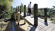 After Cyclone Nargis, aid funds distributed by Proximity boosted the economy and infrastructure, like this new, safer bridge in A Phaung Gyi. 