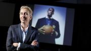 Anita Elberse, backed by a picture of basketball superstar LeBron James, an important figure in her book <i>Blockbusters</i> 