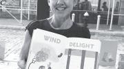 Claudia Bedrick displays one of Enchanted Lion’s books.