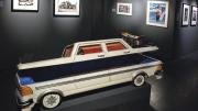 A Mercedes-shaped &ldquo;fantasy coffin&rdquo; by Samuel Kane Kwei reveals its blue fabric interior.