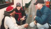 Even as BHCHP president, O’Connell spends time on the street. Here, he and physician assistant Jill Roncarati check on a homeless man.