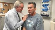 Jim O’Connell checks longtime patient Joe Meuse.