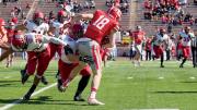 Senior linebacker Jake Lindsey (51) wrapped up Cornell receiver Ben Rogers after a nine-yard gain on this play. The Crimson limited the Big Red to 112 yards through the air in its 40-3 win.
