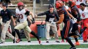 Photograph of Jack Cook setting sail for the Princeton end zone to complete a 73-yard pass-and-run touchdown