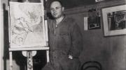 Photograph of artist Romare Bearden standing by an easel c. 1940