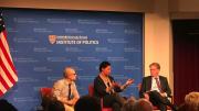 The three panelists on stage at the Kennedy School.