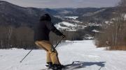 Skier in action at the top of a snow of snow-covered Berkshire East mountain 
