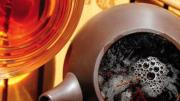 Photo of a steaming pot to tea