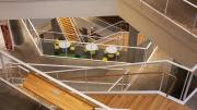 An example of the many floating staircases used to break up the massing of the building
