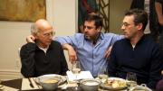 Producer Jeff Schaffer sits between star Larry David (left) and another cast member on the “Curb Your Enthusiasm” set.