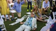 Schaffer directs a “Curb Your Enthusiasm” scene in which David lies on the ground surrounded by other cast members.