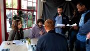 Schaffer works on a scene with star Dave Burd (second from left) and other cast members from “Dave.”