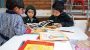 UBC focuses on classroom design and organization as well as lesson content. The program teaches that something as simple as keeping books readily accessible to children, rather than locked away in a cupboard, encourages early engagement with reading.