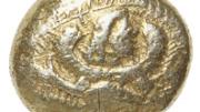 The earliest coin among Harvard’s holdings, dating from 600-550 b.c., this rather battered specimen, made of electrum, shows on the obverse a bearded, winged figure. This makes it unique, the only extant coin of the period bearing a human image. Where it was made is not known, but it is similar in other respects to coins that were widely issued at the very beginnings of coinage, about 630 B.C., in western Asia Minor and cities on the Greek coast.