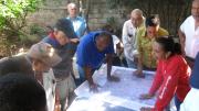 This image, provided by a member of the Boston University delegation upon his return from Haiti, shows the wall map sheets printed at Harvard being used for damage assessment surveys.