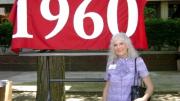 Betty Breck eagerly awaits the arrival of other 1960 classmates at the 50th Reunion Headquarters in Eliot Hall.