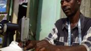 Matia Lule works as a tailor in Mbarara. SHIP provided the loan for him to buy his sewing machine; this business helps Lule afford transportation to the clinic to get his medicines, and other living expenses.