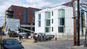 Two views of the Kyu Sung Woo-designed graduate-student housing now rising on Memorial Drive.