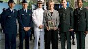 At the ROTC ceremony, from left to right: U.S. Air Force second lieutenants Roberto A. Guerra and Michael J. Arth, U.S. Navy ensign John D. Reed, President Faust, and U.S. Army second lieutenants Jason M. Scherer and J. Danielle Williams.