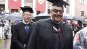 Representatives of 220 academic institutions joined the procession into Tercentenary Theatre—in the rain. Among them were