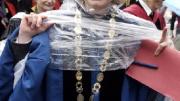 Elizabeth Fleming, President of Converse College, in the preferred garb of the day: academic gown and Harvard-supplied po