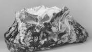 Claes Oldenburg, Baked Potato, 1963. Exterior skin and two pieces of butter: burlap soaked in plaster, painted with enamel; interior: jersey stuffed with kapok, 17.6 x 35.1 x 24 cm 