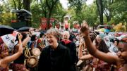 The Harvard College Pan-African Dance and Music Ensemble gives Drew Gilpin Faust, attired in Harvard’s presidential gown, a raucous welcome. President emeritus Derek Bok and James R. Houghton, Senior Fellow of the Harvard Corporation, follow her in the procession into Tercentenary Theatre.
