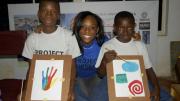 Camp participants Alabi Dolapo and Ayoade Basirat show off their artwork.