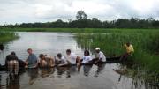 Having finished distributing nets for the day, the GMin team relaxes on a boat ride. The riders, from left to right: Clement Wright ’09; GMin cofounder Mathias Esmann, who attended an international high school in Norway with Sengeh and now attends Princeton; Jamie Appleseed, another GMin cofounder who is now the organization’s executive director; Sam Slaughter ’09; David Sengeh ’10; and Red Cross volunteer Jacob Sandy, the boat’s owner.