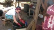 Ryan dyes cloth during her apprenticeship with Sackui.