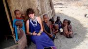 Megan Shutzer ’10 first traveled to Africa during her junior year; she spent a semester traveling around Tanzania on a program learning about wildlife ecology and the conservation industry. Here, she is shown near Lake Natron in northern Tanzania, where she did a homestay with a Masai family (including some of the children shown).