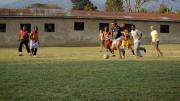 As part of the 2008 program studying conservation, Shutzer and other American students lived in Bangata, a town in northern Tanzania, for three weeks. Here, Shutzer takes the ball in a “USA v. Tanzania” soccer match that pitted the American students against girls from Bangata.