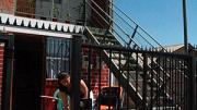 Joanna Vera’s duplex; the woman pictured is her downstairs neighbor.