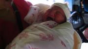 Zhang Na's newborn baby. Her name is 'Earthquake'