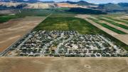South Jordan, Utah - Isolated exurban communities built on cheap agricultural land depend on cars for nearly every activity. To access urban centers, residents often have to commute long distances. Because the land is virtually undeveloped, all aspects of modern infrastructure (water, sewer, electric, and roads) must be extended.