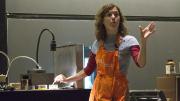 Amy Rowat stirs cocoa powder into cocoa butter to show that the two substances don't blend easily.
