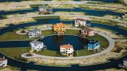 Homes in Galveston, Texas, are built on wetlands. MacLean fears that, if the sea level rises, communities like this one will be especially vulnerable.
