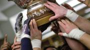 IVY TROPHY: Harvard celebrates its first repeat title since 1982-83.