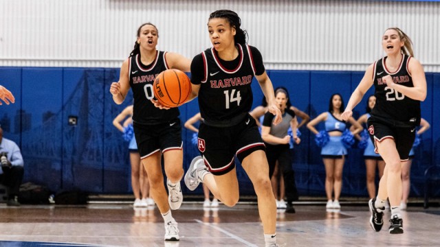 Harmoni Turner dribbles the ball up the court 