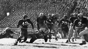 Harvard at Army, 1948: The Black Knights won, 20-7. The ball carrier is Chuck Roche ’50. 